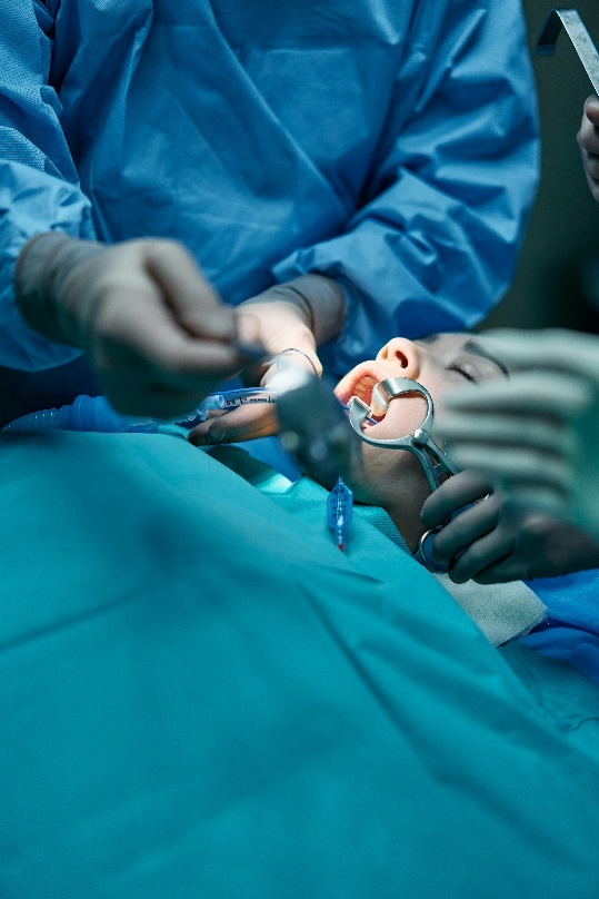 A person undergoing oral surgery